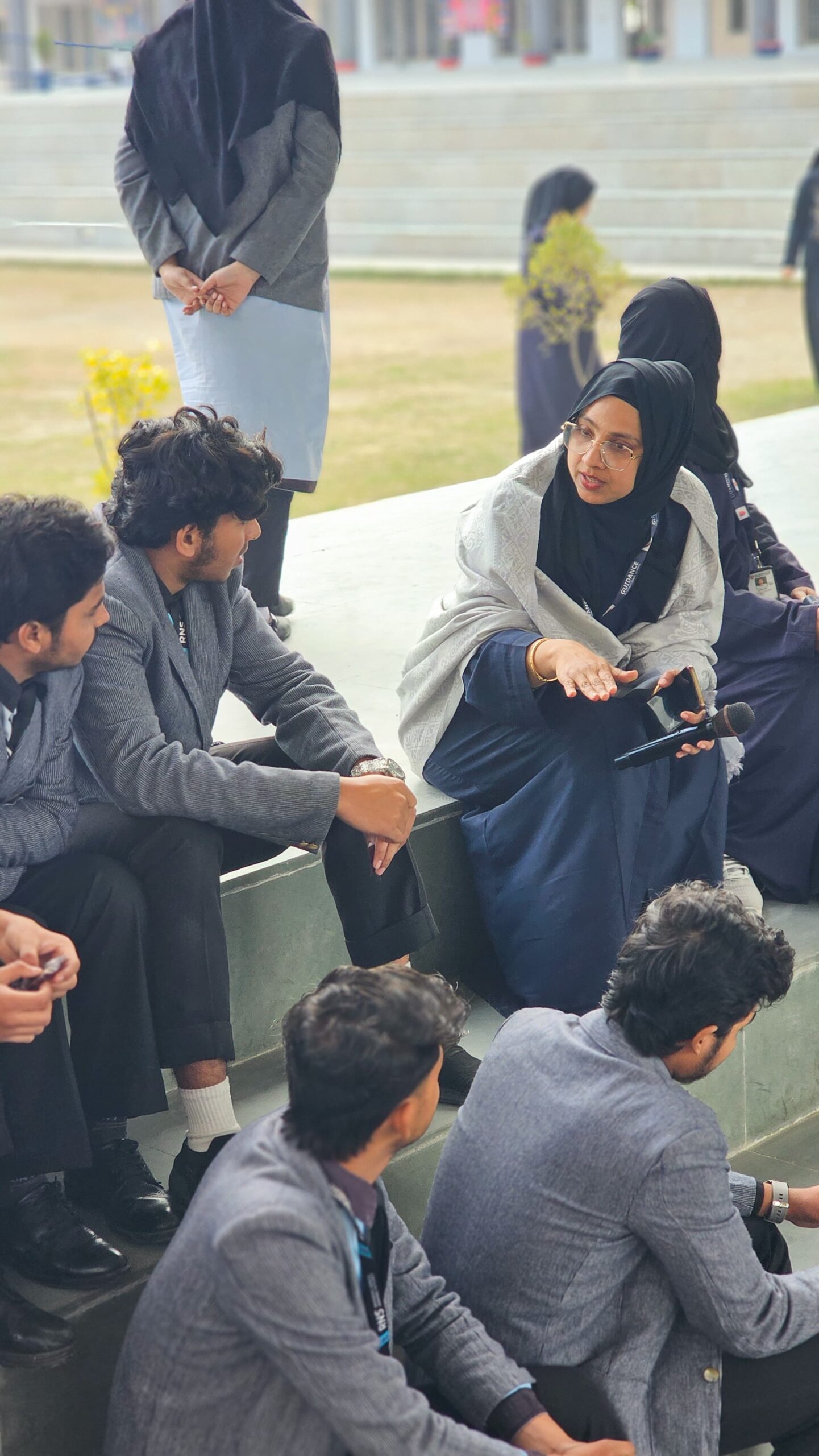 Students interacting with expert educator